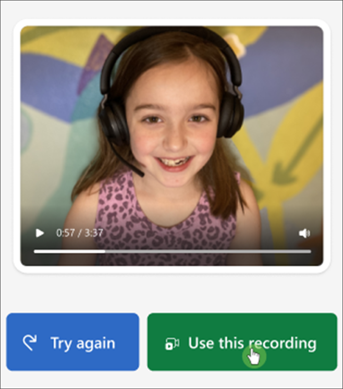 Screenshot of the student view of reading progress, a white girl with a few missing teeth smile into the camera and buttons below her read try again and use this recording