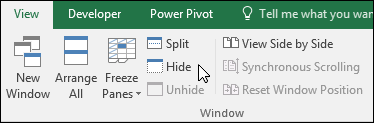 Hide or show a workbook from View > Windows > Hide/Unhide.
