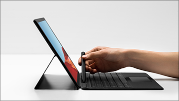 A Surface Slim Pen being used to draw on a Surface Pro device.
