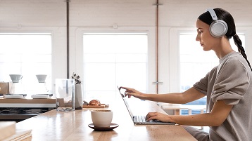 Man using a Surface on a desk